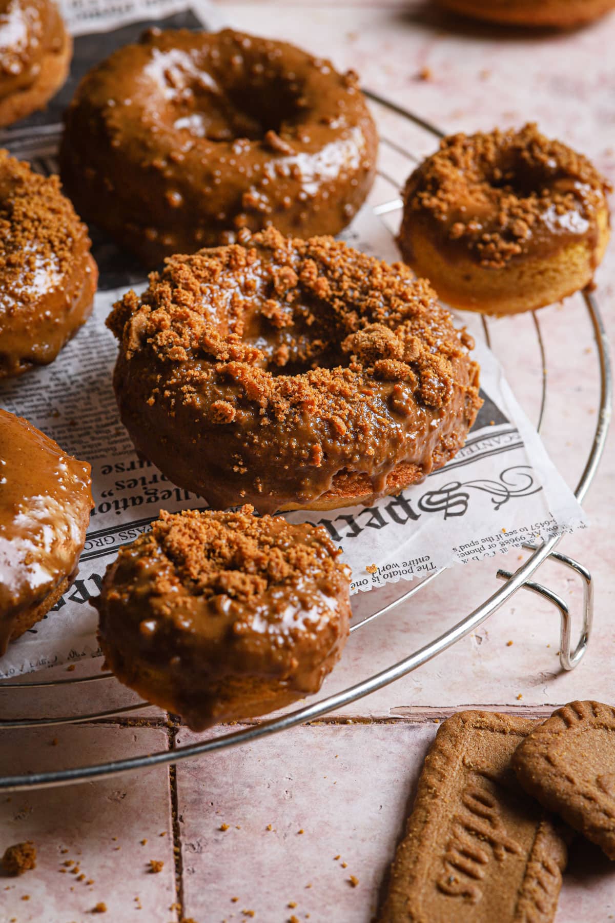 baked pumpkin donuts with biscoff glaze.