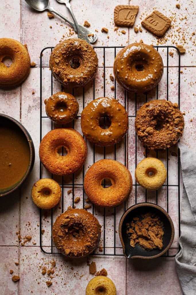 Baked pumpkin donuts dipped with biscoff batter.