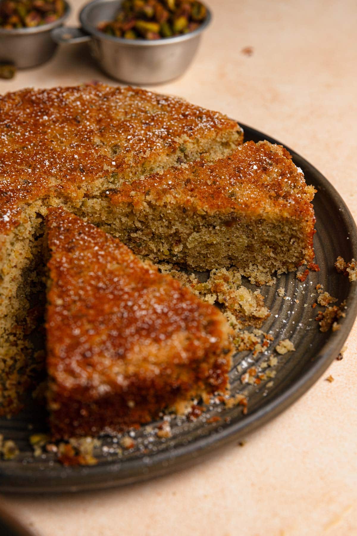Pistachio torte in a plate.