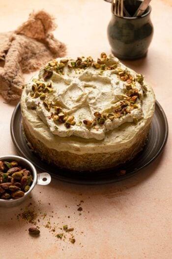 no bake cheese cake with pisatchios topped with pistachio whipped cream.