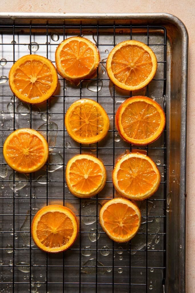 orange slices on top of a wire rack.