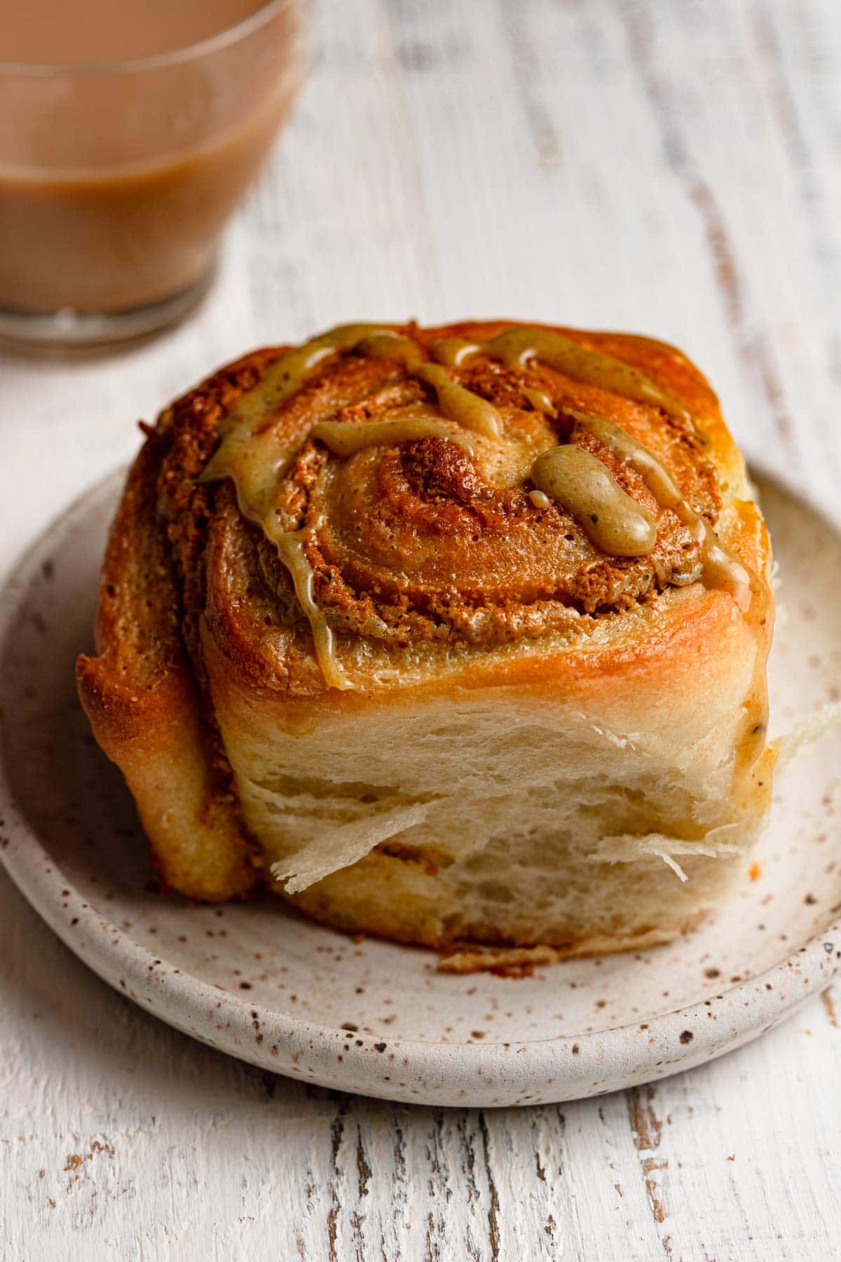A pistachio roll on a plate.