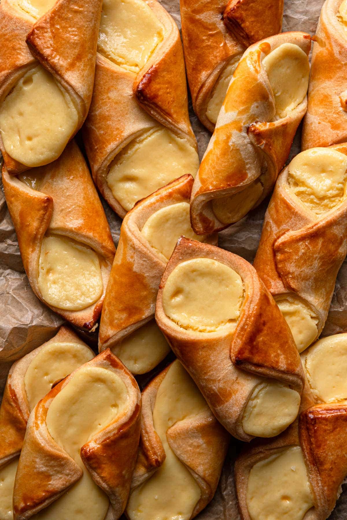 Baked brioche pastries filled with cheese filling.