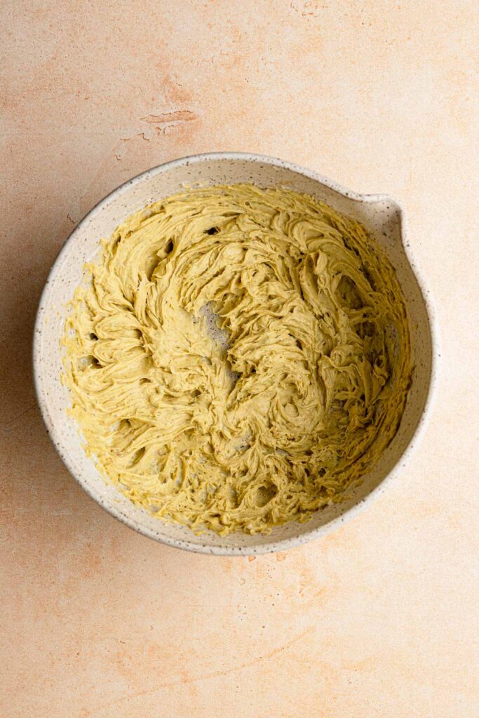 A large bowl with pistachio cream.