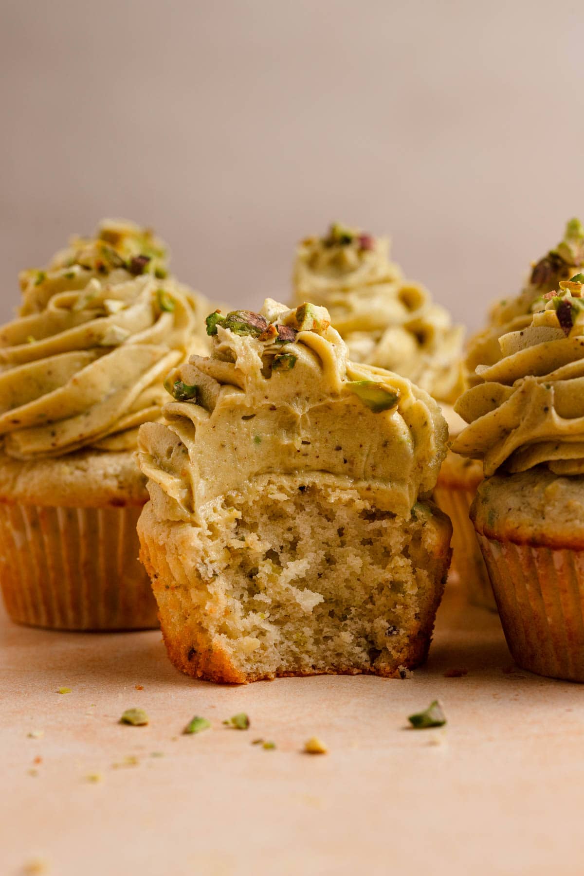 Pistachio cupcake topped with pistachio butter cream.