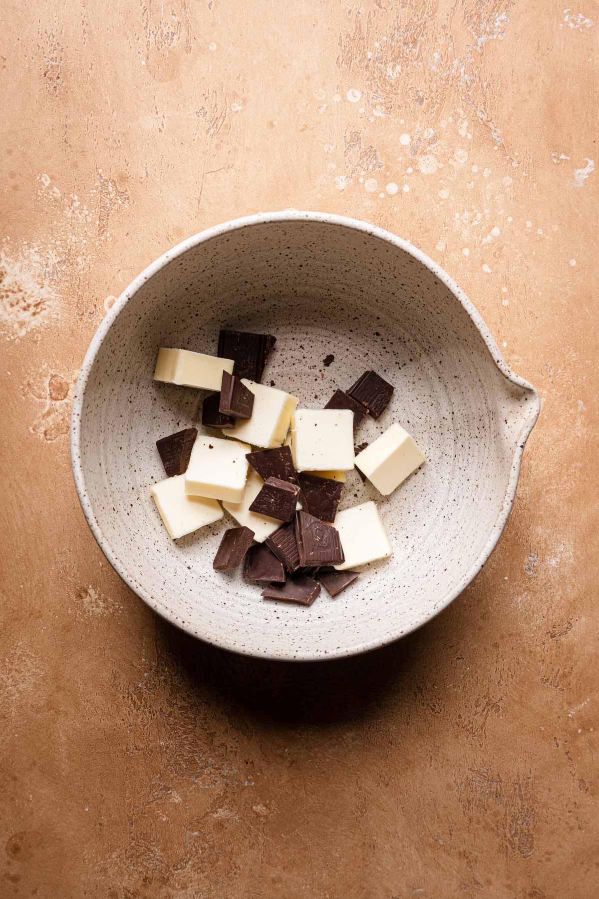 A bowl with butter and chocolate.