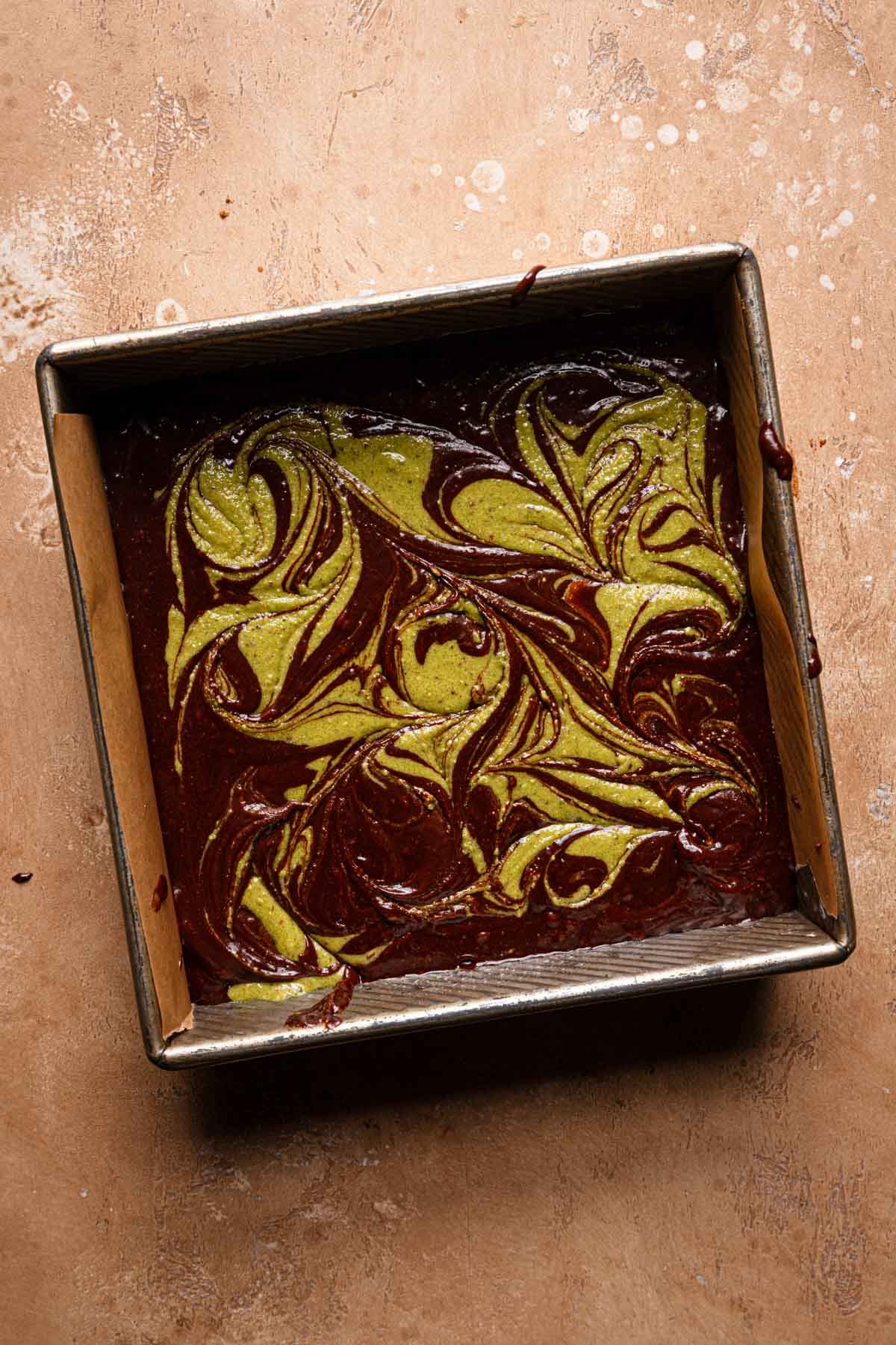 Unbaked pisatchio brownie.