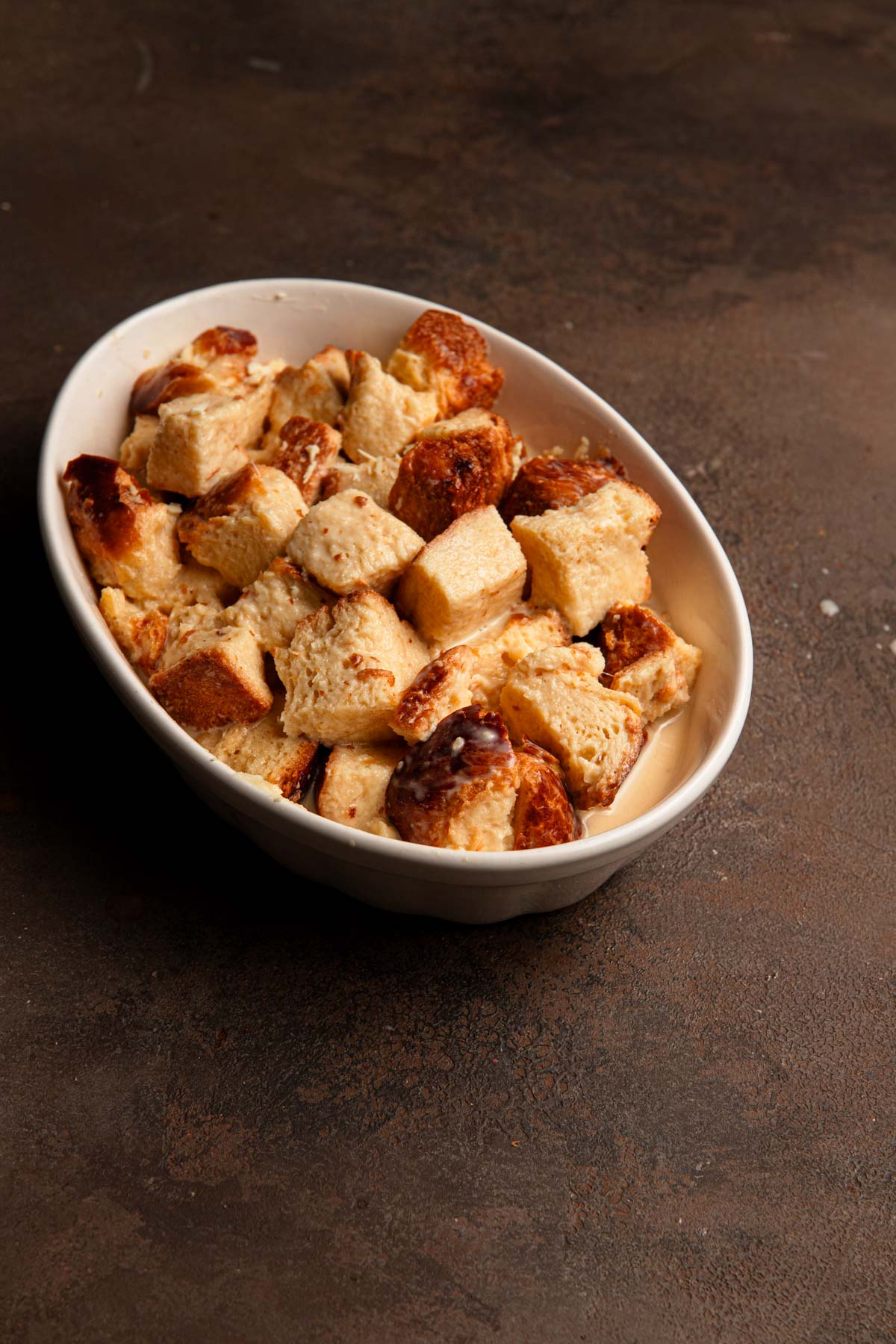 Unbaked brioche bread pudding.