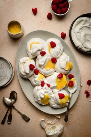 pull apart meringue with lemon curd and raspberries.