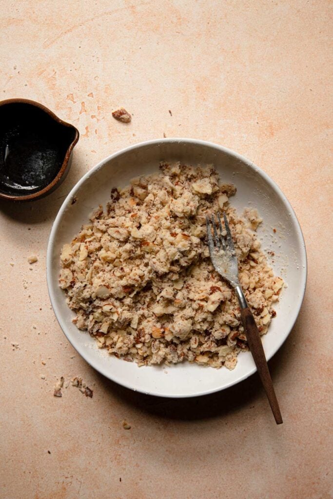 A bowl with almond crumble.