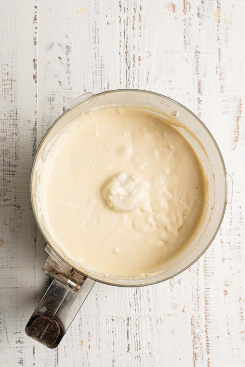 A food processor with cheese filling.