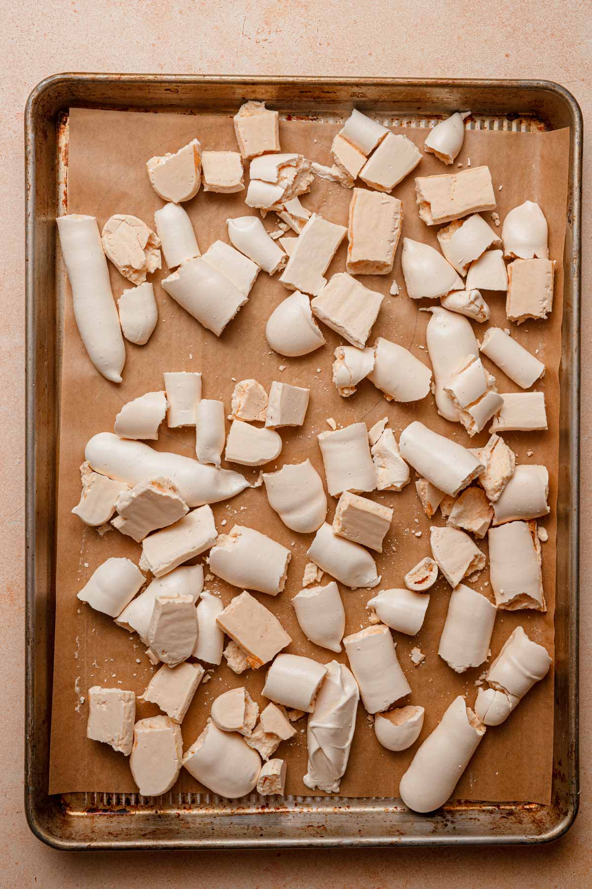 Broken baked meringue cookies.
