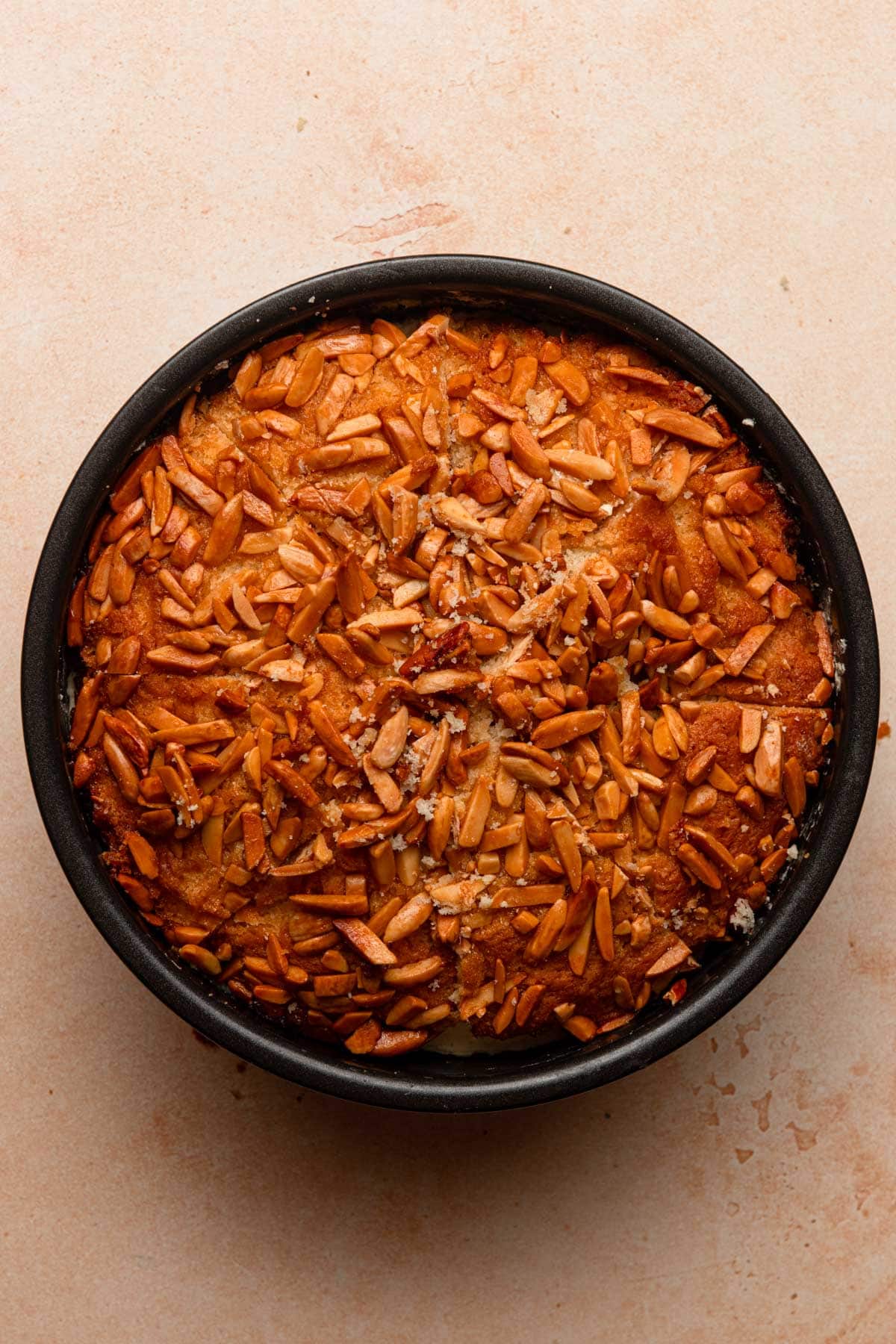 Bienenstich cake topped with almonds.