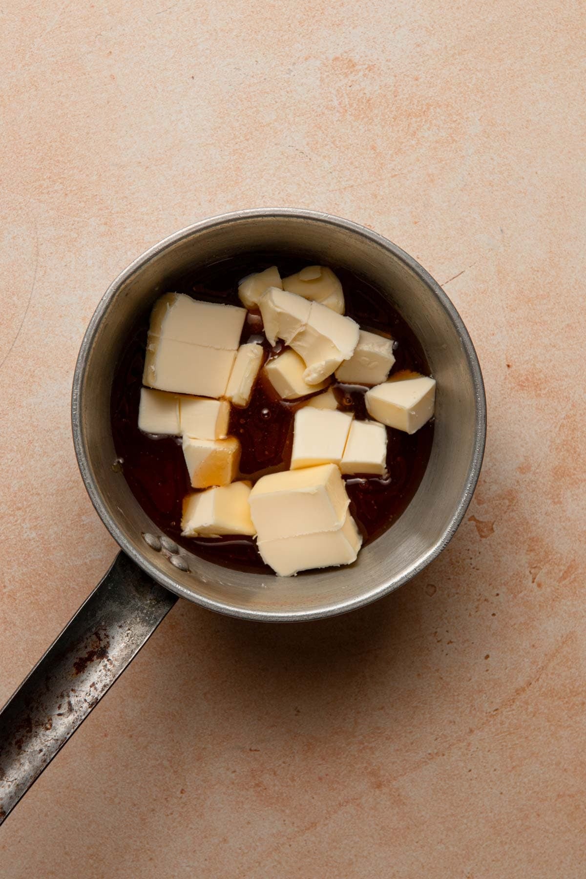 A sauce pan with honey and butter.