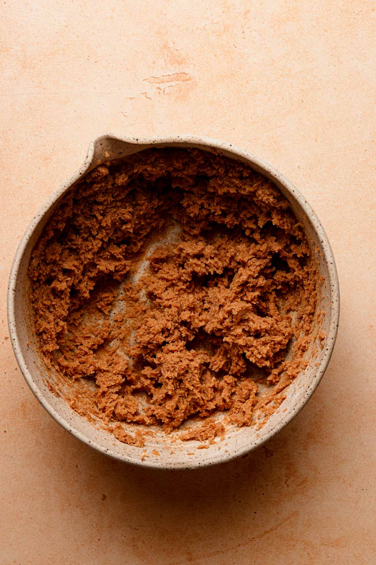 A large bowl with cinnamon filling.