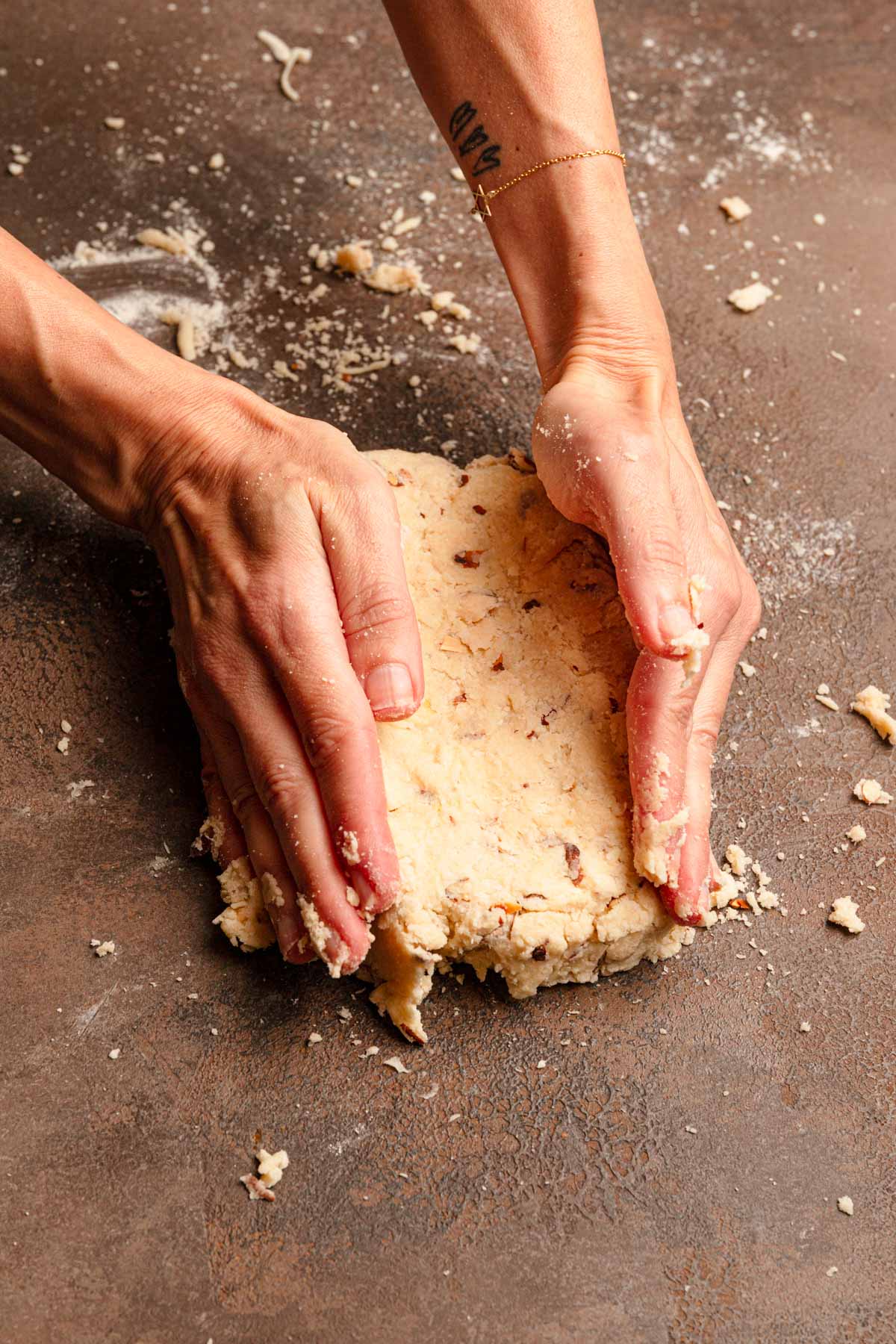 Pressing scone dough into a dough.